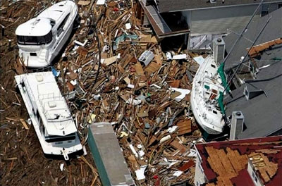 Boats pushed ashore by Hurricane Katrina