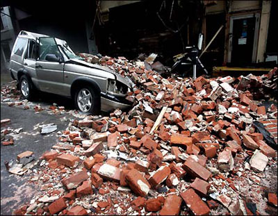 A car crushed by bricks