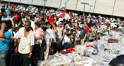 Hurricane Katrina survivors await evacuation at the Superdome